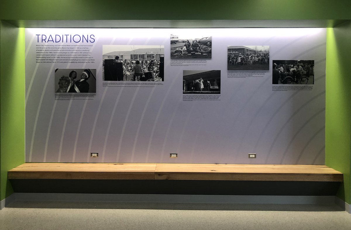 exhibit wall showing photos
