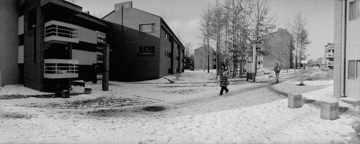 bw photo of apartment complex in snow