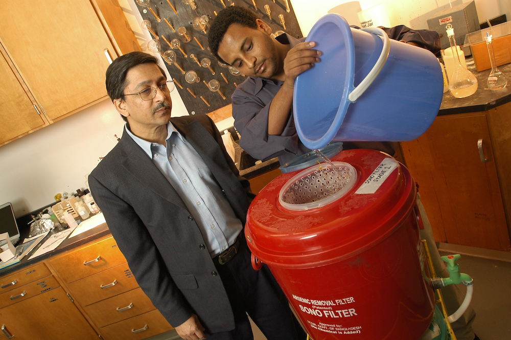 two men working in lab