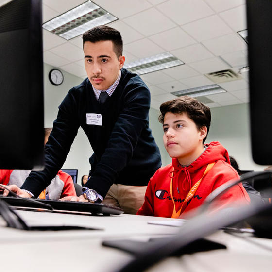 Middle-school aged students learns about computing in an EIP program at Mason. 